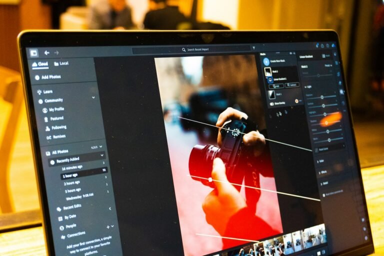 Photo editing software displayed on a laptop