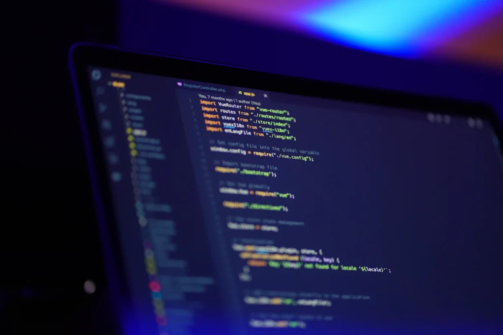 Source code displayed on a dark computer screen